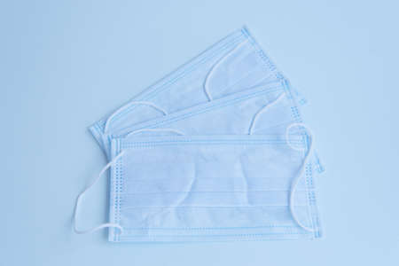 Medical mask of blue color for protection against flu and other diseases. Surgical protective mask....