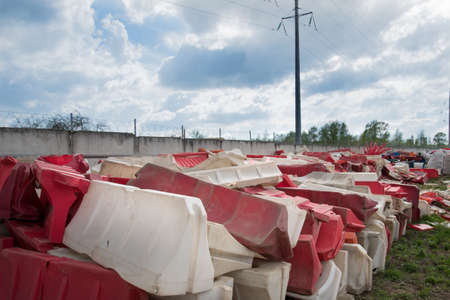 Road plastic blocks of different colors The blocks are piled in a big pile. The concept of getting rid of prohibitions. End of quarantine and pandemic.の写真素材