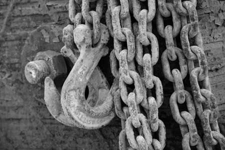 A large rusty chain with hooks. Background, texture.の写真素材