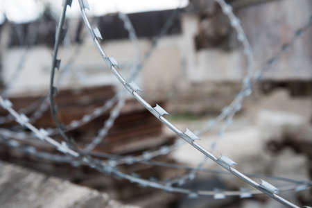 Close-up of barbed wire. Concept of restriction of freedom. Background