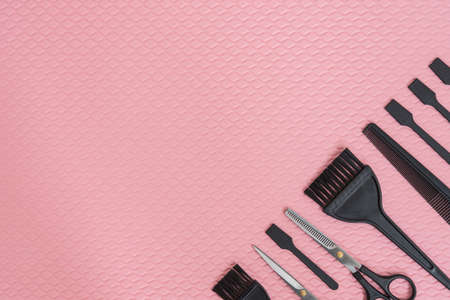Barber accessories, laid out on a pink background. Postcardの写真素材