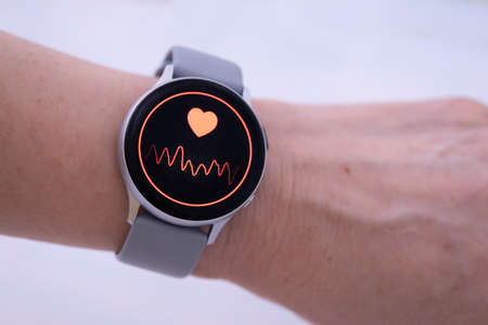 Heart rate check with smart watch. Close-upの写真素材
