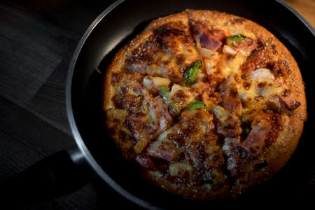 pizza in a panの写真素材