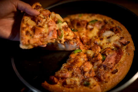 pizza in a panの写真素材