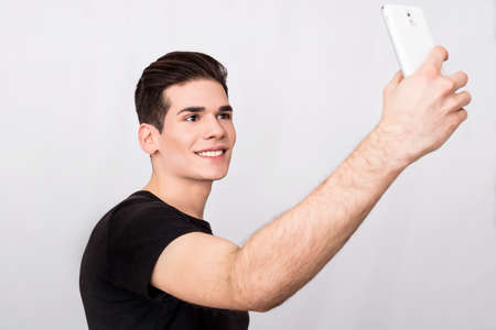 Man taking a selfieの写真素材