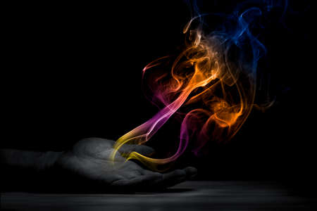 Spirit smoke out of a palmの写真素材