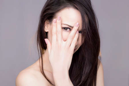 Peaking womanの写真素材