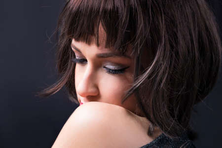 Gorgeous woman looking downの写真素材