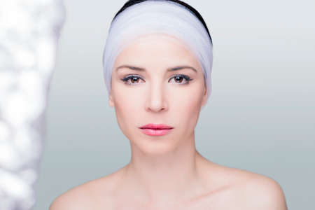 Beauty shoot of a woman with a white stripeの写真素材