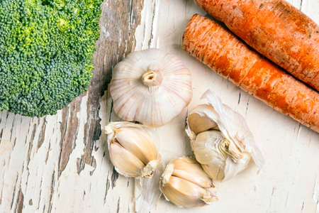 Garlic broccoli and carrot vintage shotの写真素材