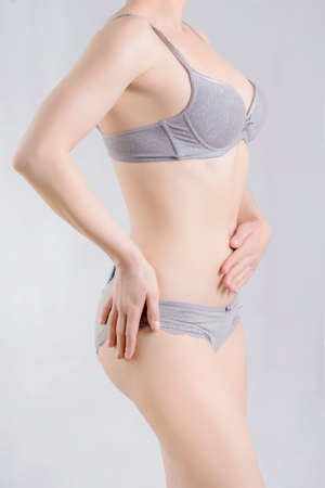 Womans body in shape in underwearの写真素材