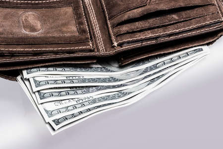 Hundred dollar bills in a walletの写真素材