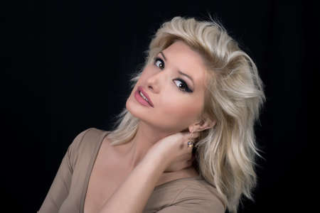 Beautiful blonde woman posing