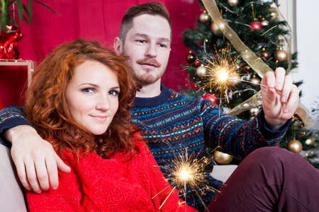 Redhead couple on Christmas dayの写真素材