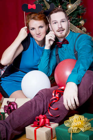 Couple of redheads celebrating Christmasの写真素材