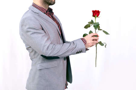 Man offering a rose for Valentinesの写真素材