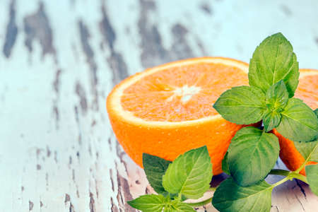 Orange slice with mint leavesの写真素材