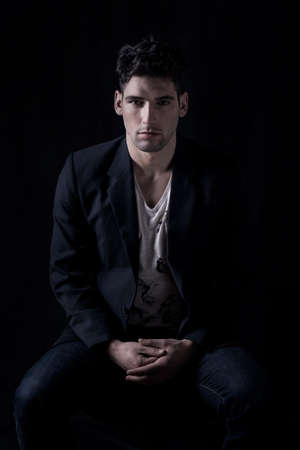 Man sitting in the dark