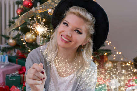 Happy blonde woman on Christmasの写真素材