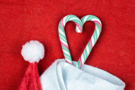 Two lollipops out of a Santas hatの写真素材