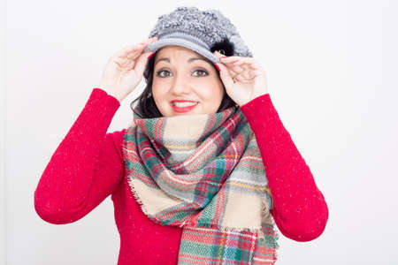 Happy girl wearing a hatの写真素材