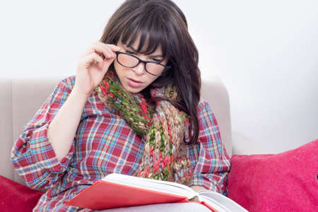 Hipster girl readingの写真素材