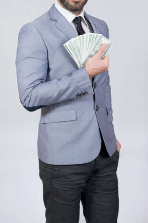 Man holding dollar billsの写真素材
