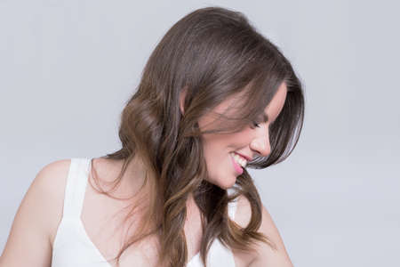 Beautiful brunette smilingの写真素材