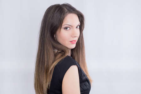 Girl posing in a beauty studio shotの写真素材