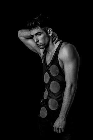 Fashion shot of a man in black and whiteの写真素材