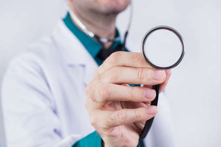 Doctor holding a stethoscopeの写真素材