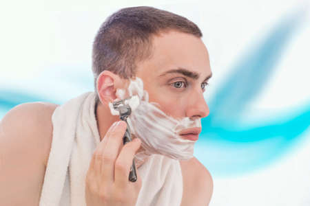 Man shavingの写真素材