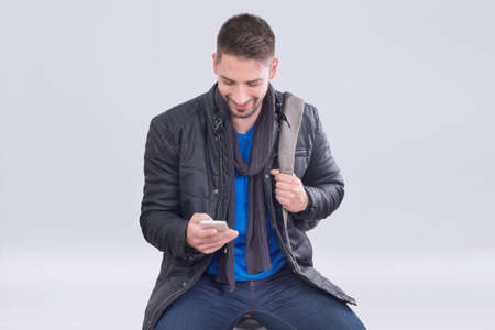 Passenger typing on a cell phoneの写真素材