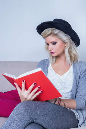 Blonde girl readingの写真素材