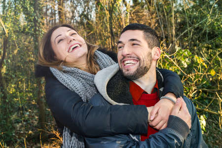 Happy couple having fun in natureの写真素材