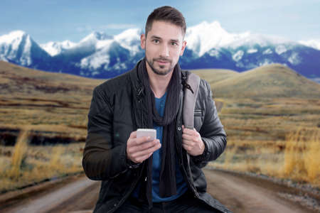 Traveler using a cell phoneの写真素材