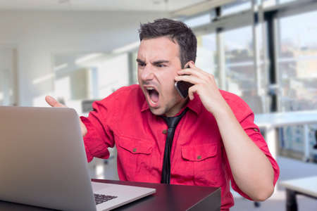 Businessman screamingの写真素材