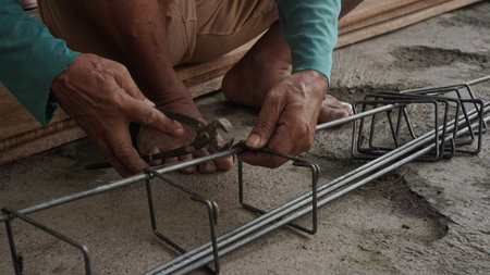 Workers are working on the floor of a new house in Thailand.の写真素材