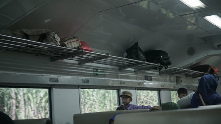 Unidentified people travel by bus in Bangkok, Thailand.の写真素材
