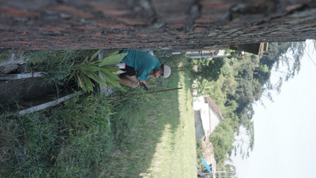 Farmer working on the terrace of a house in Thailand.の写真素材