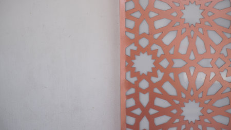 Arabic pattern on the wall of a mosque in Dubai, UAEの写真素材