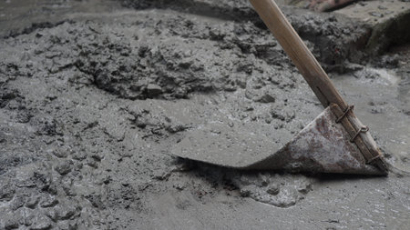 Close-up of a shovel on the ground. Construction site.の写真素材