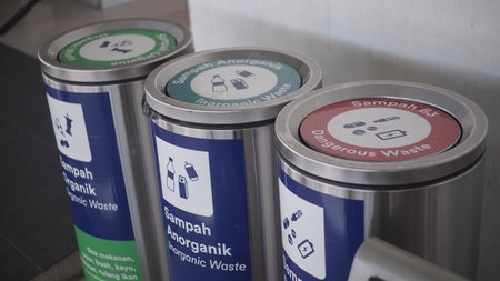 Recycling bins in the public toilet, closeup of photo