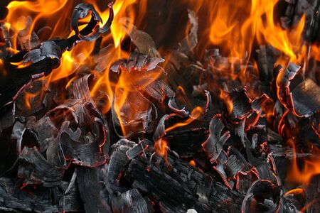 this is a close up shot of fire under my grill like nice background