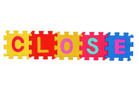 letters-puzzle, word CLOSE, isolated on white background. の写真素材