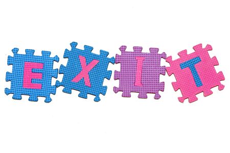  letters-puzzle, word EXIT, isolated on white background. の写真素材