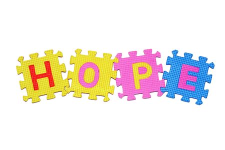 letters-puzzle, word HOPE, isolated on white background. の写真素材