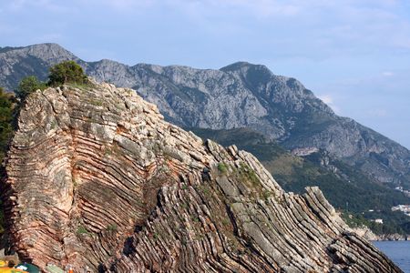This is a closeup shot of some old cliff on the sea coast in Montenegro, like nice background.の写真素材