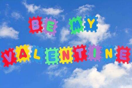 This is love note Be my Valentine, with sky and clouds in background.の写真素材