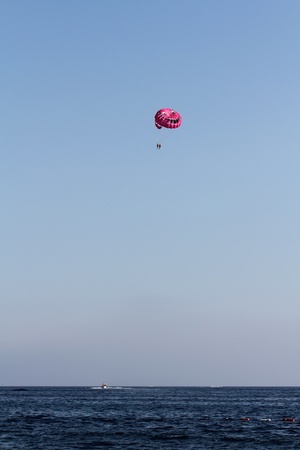 Parasailing on the sea beach in summer.の写真素材